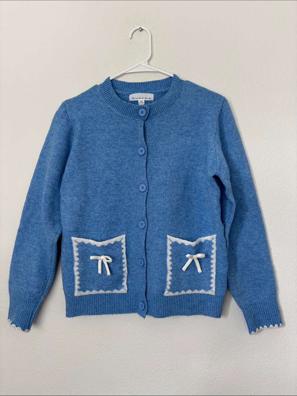 Classic Blue Button-Front Cardigan with Contrast Pocket Detail with Bows